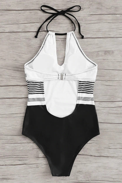 Bañador de mujer de una pieza con cuello halter, abertura frontal y sección media a rayas-Swimwear for women-Casaluzia