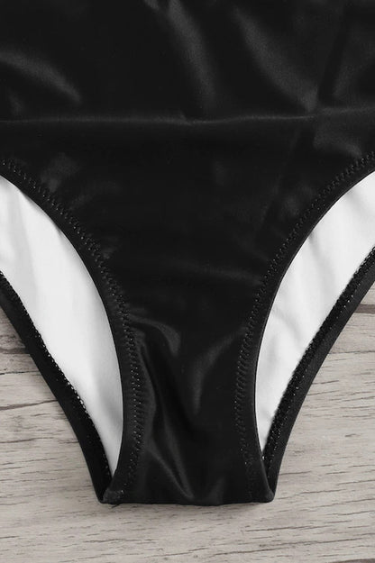 Bañador de mujer de una pieza con cuello halter, abertura frontal y sección media a rayas-Swimwear for women-Casaluzia