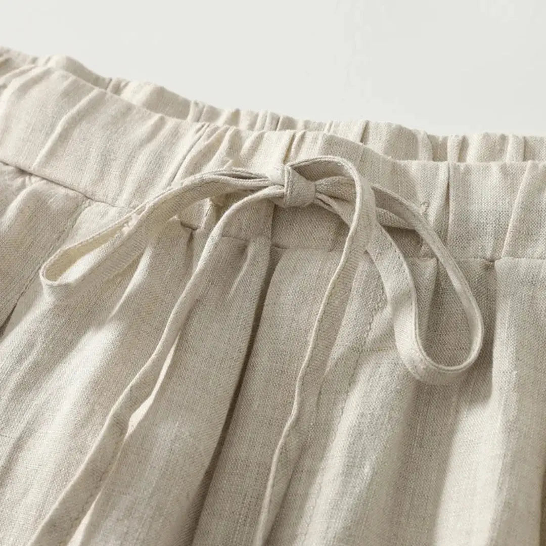 Pantalón de mujer de tiro alto con pernera ancha, cordón ajustable y bolsillos laterales-Pants for women-Casaluzia