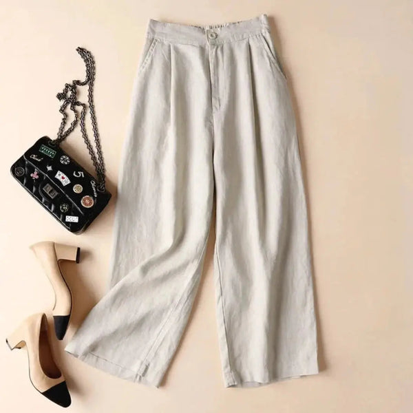 Pantalón de mujer de tiro alto con pernera ancha, pliegues frontales y bolsillos laterales-Pants for women-Casaluzia
